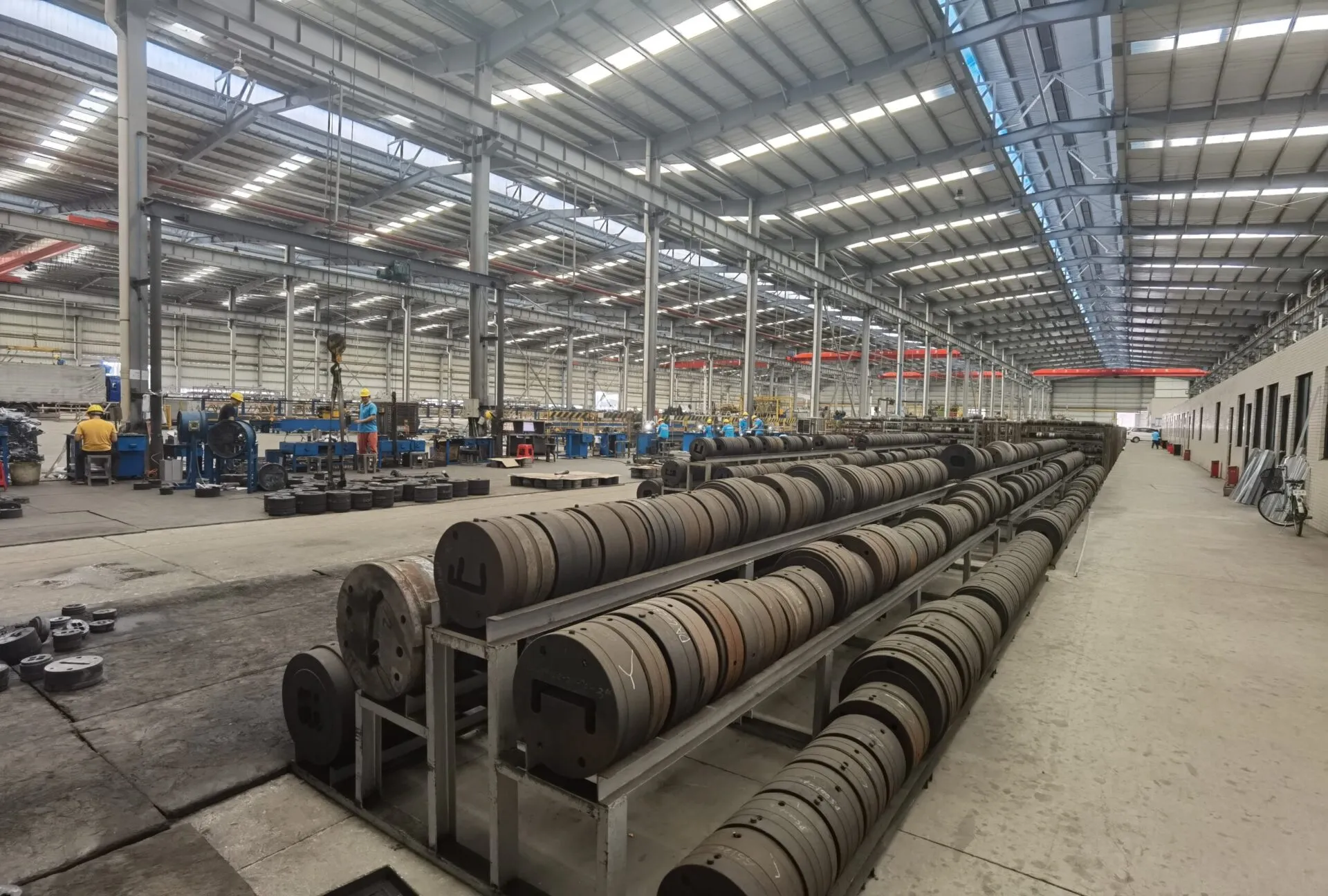 Aluminium coils stored on racks in our factory hall