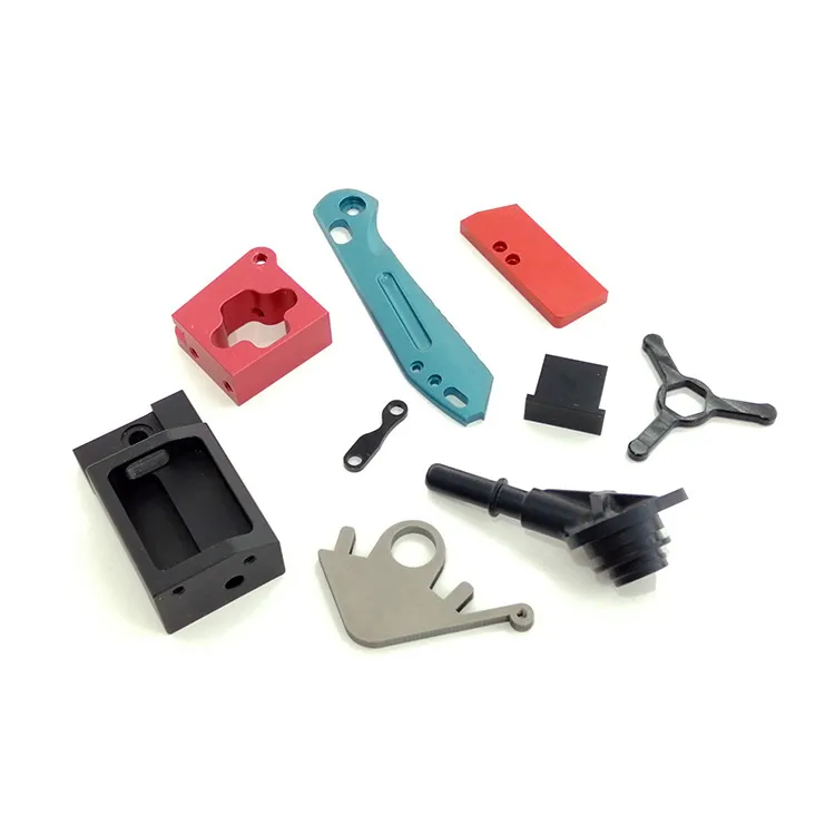 Flat machined parts in red, teal, black and grey