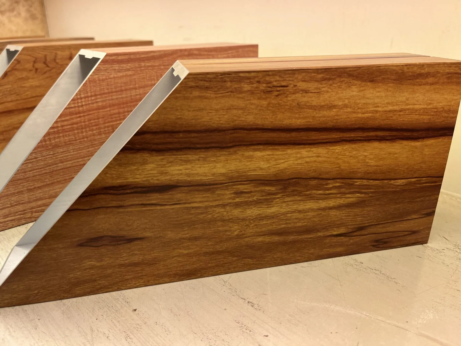 Close-up of a wood-grain finished aluminium frame profile