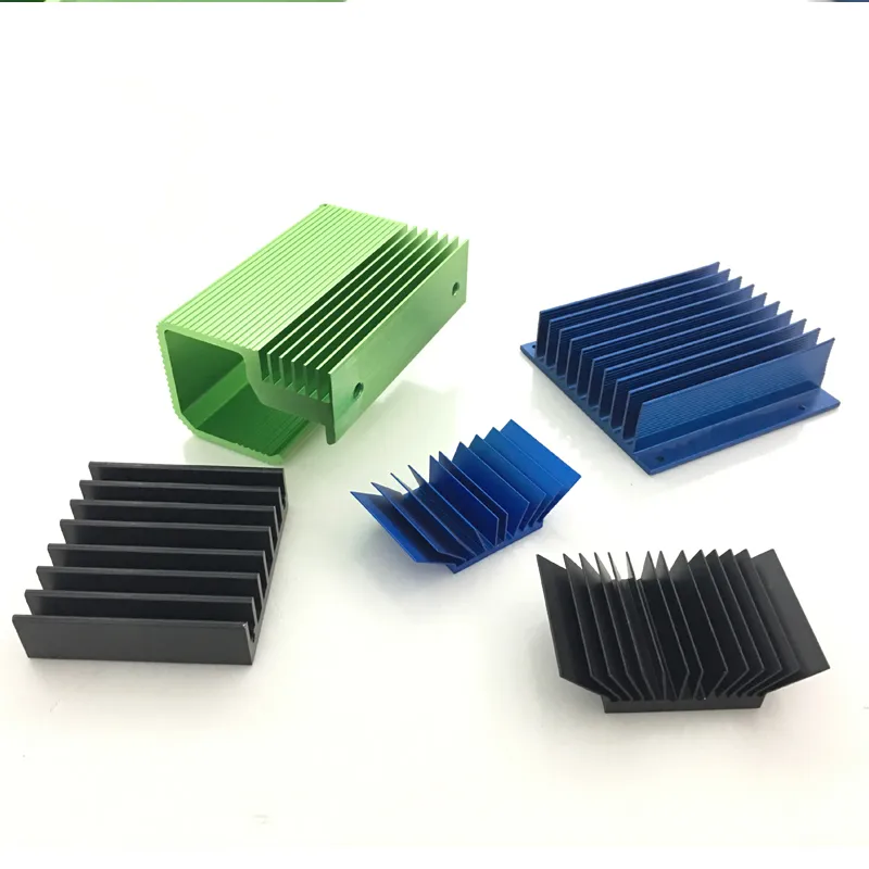 Green, blue and black anodised heatsinks of different shapes