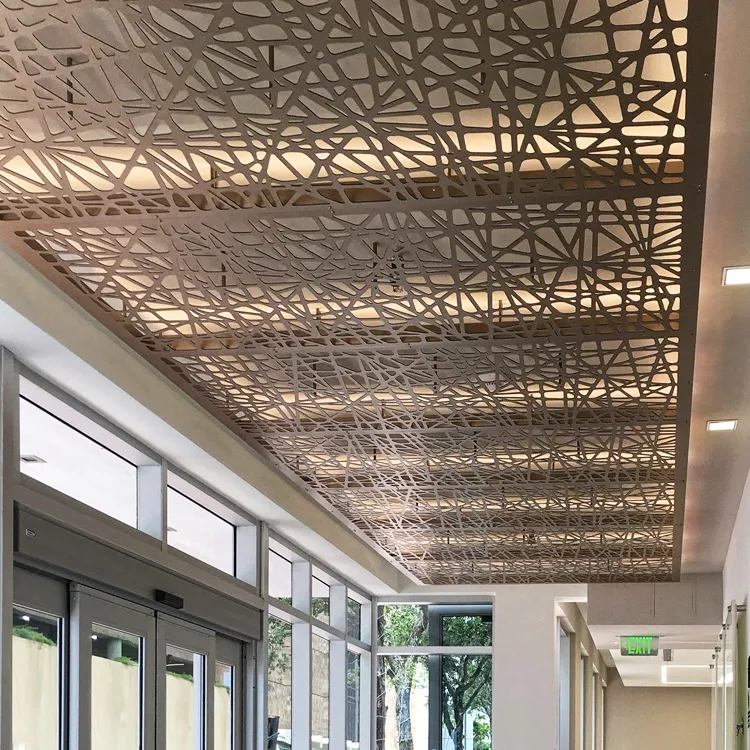 Cut-out aluminium ceiling panel with a linear pattern in a glazed corridor